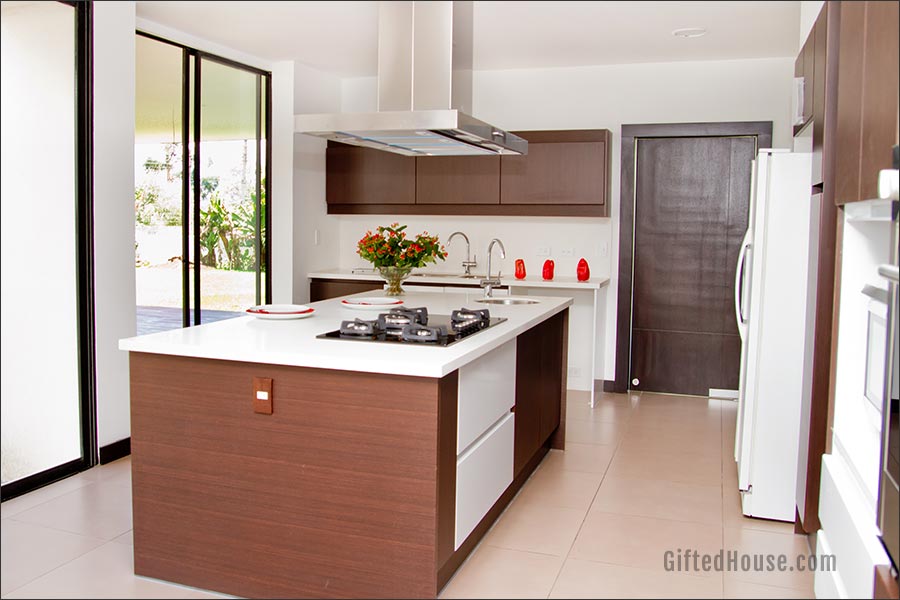 Brown cabinets with White Walls